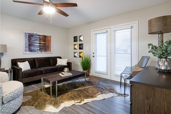 Living Room With Expansive Window at Terraces at Southaven, Southaven, MS, 38671